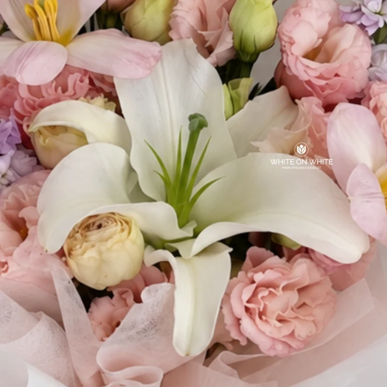 Softly Yours pink and purple flower bouquet with white lily, pink tulips and pastel Matthiola