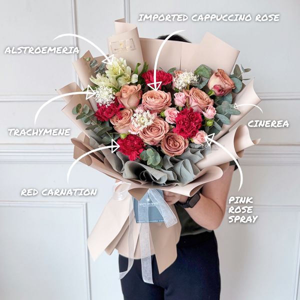 Imported cappuccino rose bouquet with red carnation with alstroemeria with trachymene with rose spray