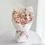 Pink and white roses in elegant bouquet, perfect for special occasions in Singapore.